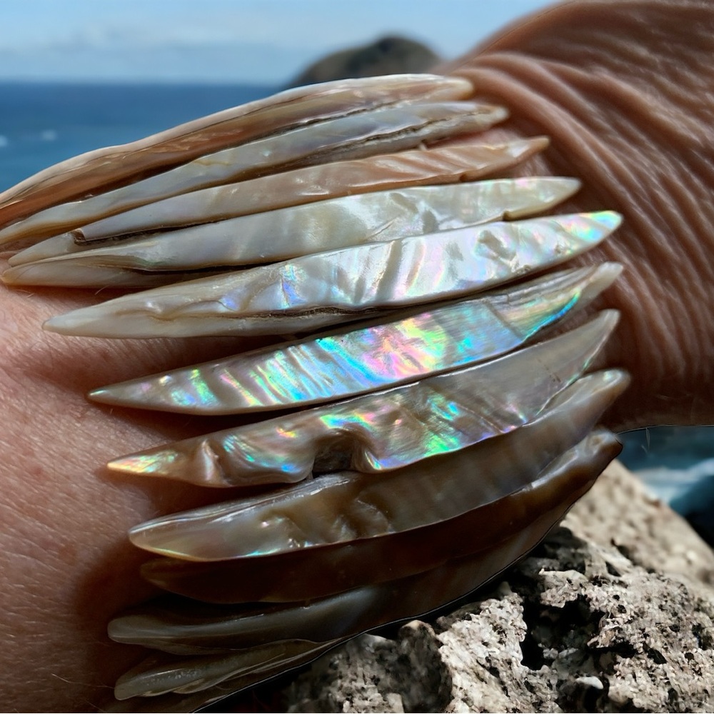Mother of pearl stretch cuff bracelet.